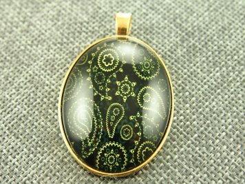 Resin Cabochone in cast with a three dimensional effect, size 50x32mm