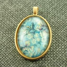 Resin Cabochone in cast with a three dimensional effect, size 40x25mm. 