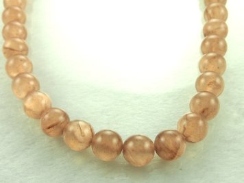 Semitransparent jade beads 12mm Brown cord 40cm