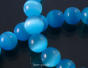 Cat's Eye, balls, 8mm blue Cord 48pcs